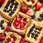 Puff Pastry topped with berries and cream cheese filling.