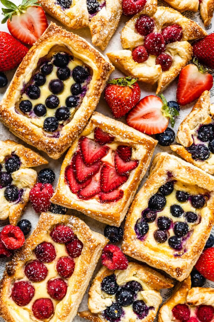 Puff Pastry topped with berries and cream cheese filling.