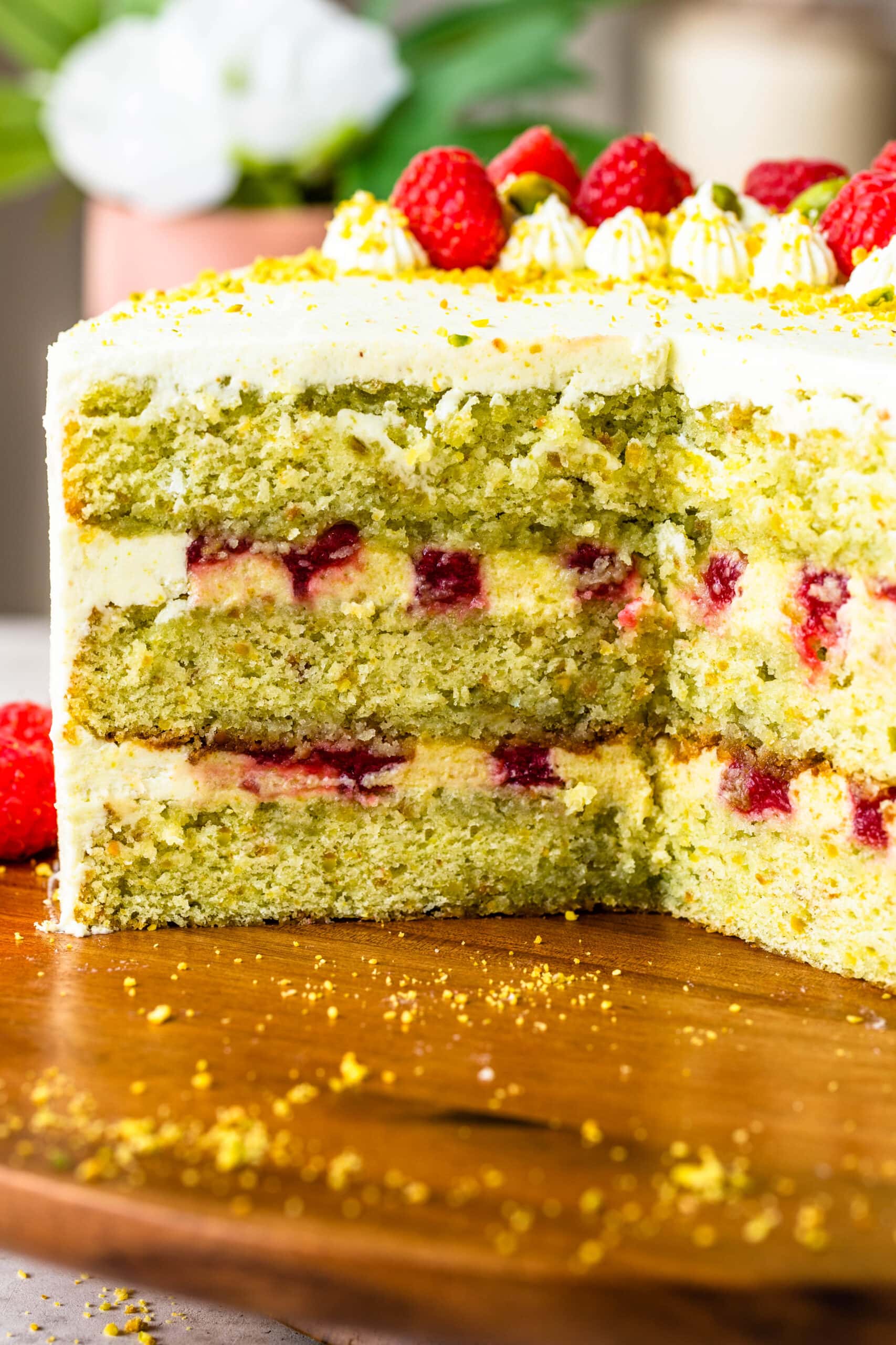 slice of pistachio raspberry cake.