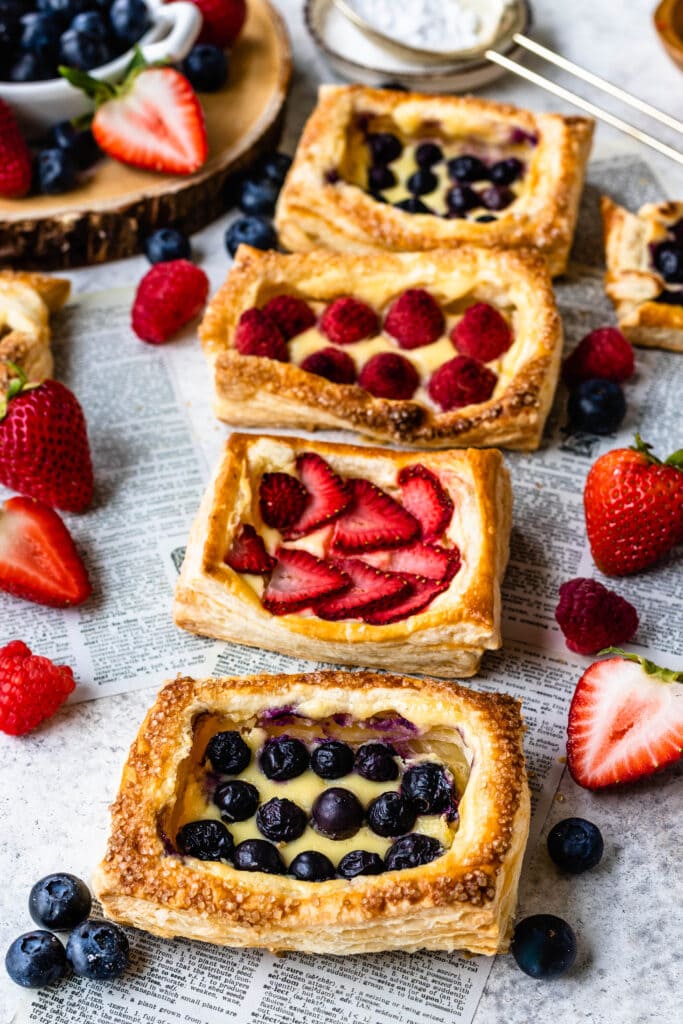puff pastries filled with berries and cream cheese filling.