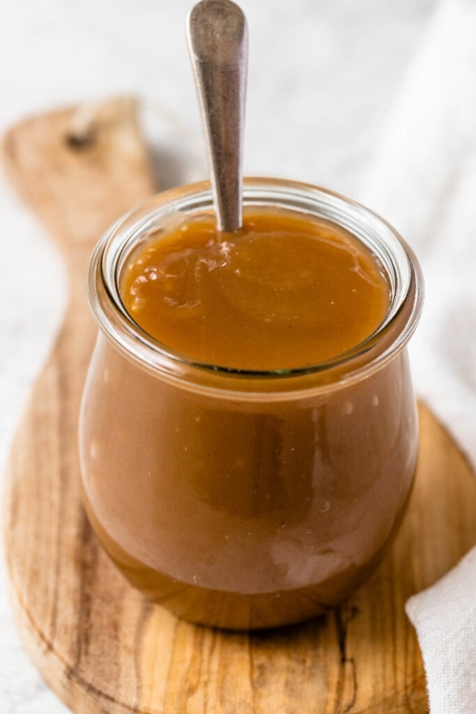 vegan dulce de leche sauce in a jar.