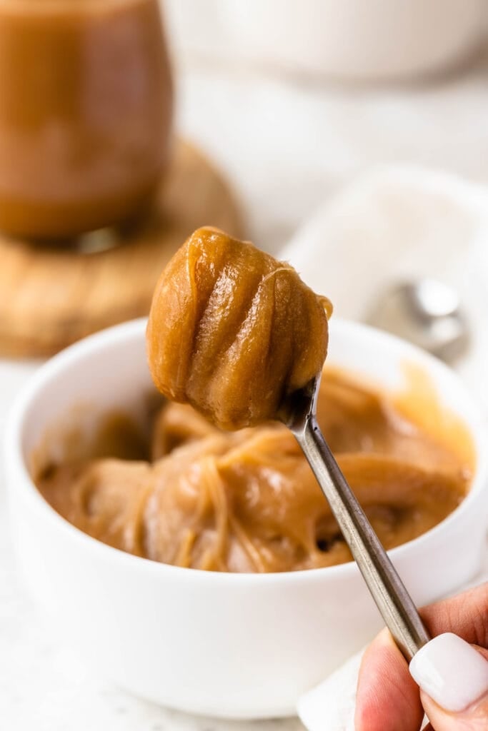 vegan dulce de leche on a spoon.