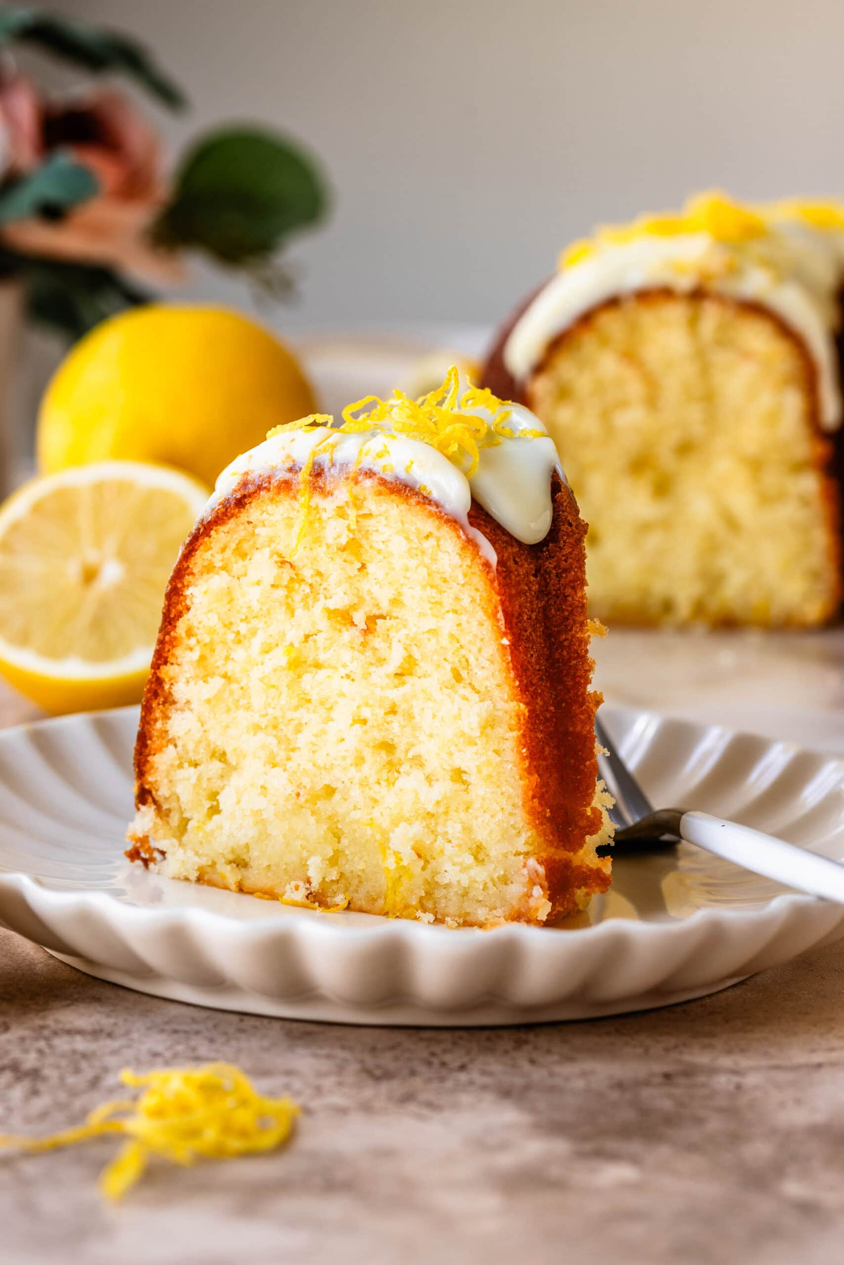 slice of lemon cake on top of a plate.