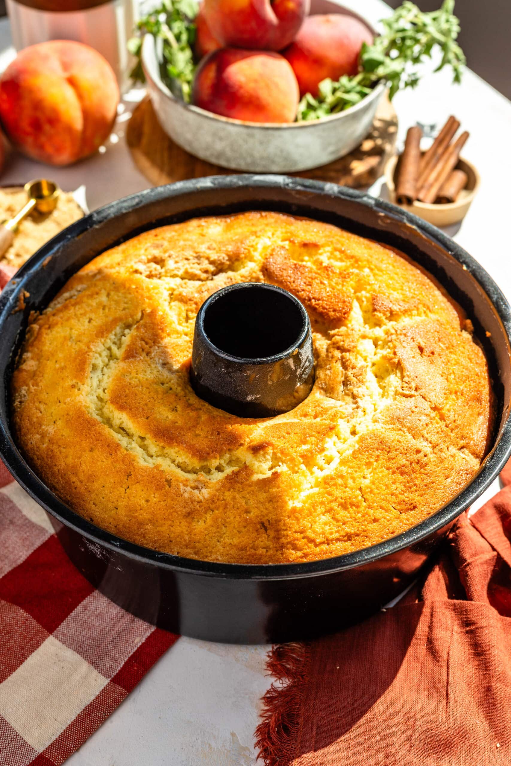 baked peach cake in a bundt pan.