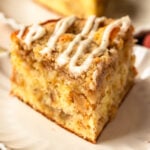 Apple crumb cake with glaze on top.