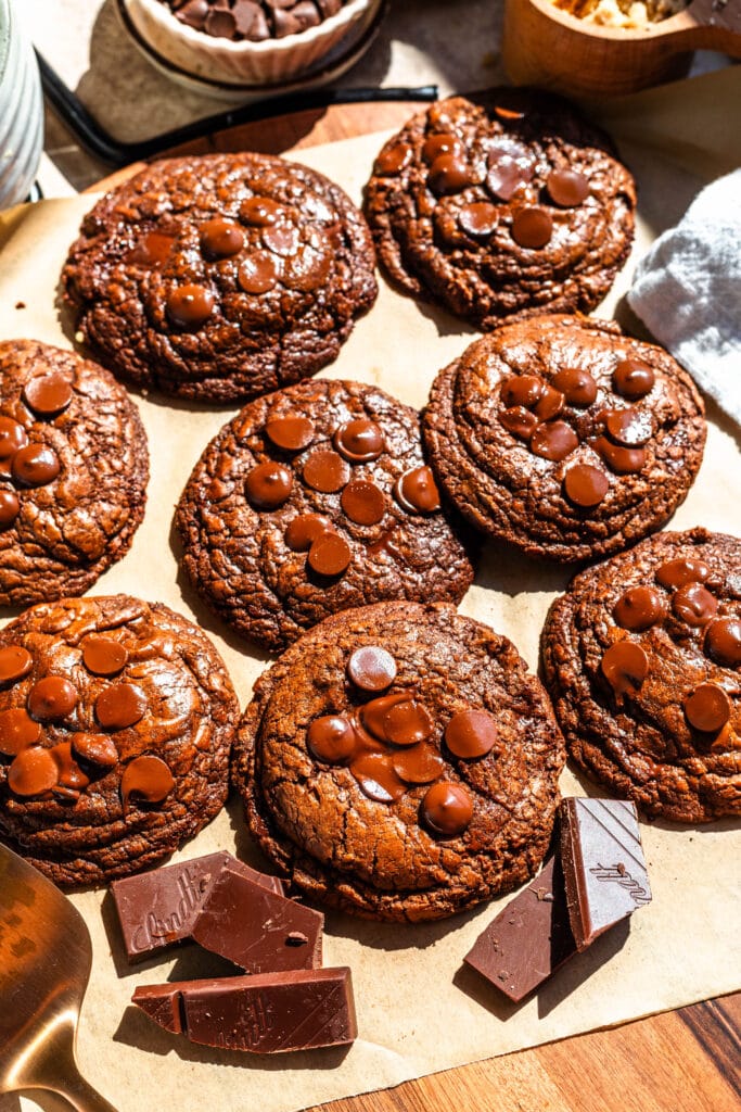 brownie chocolate cookies with chocolate chips on top.