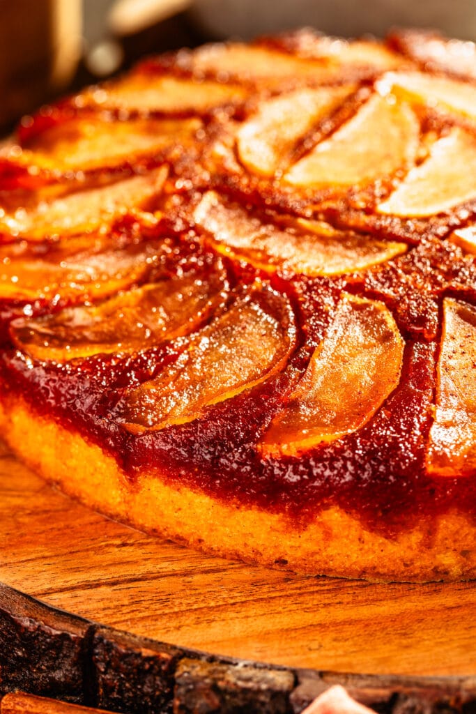 Apple Upside Down Cake with apples and caramel on top.