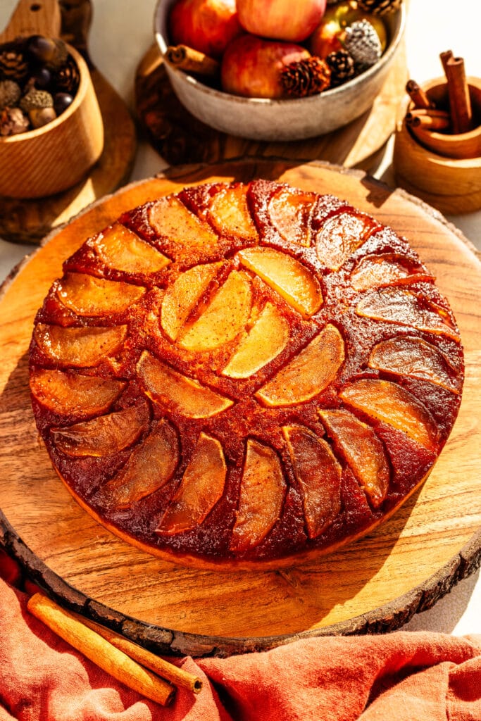 Apple Upside Down Cake with apples and caramel on top.