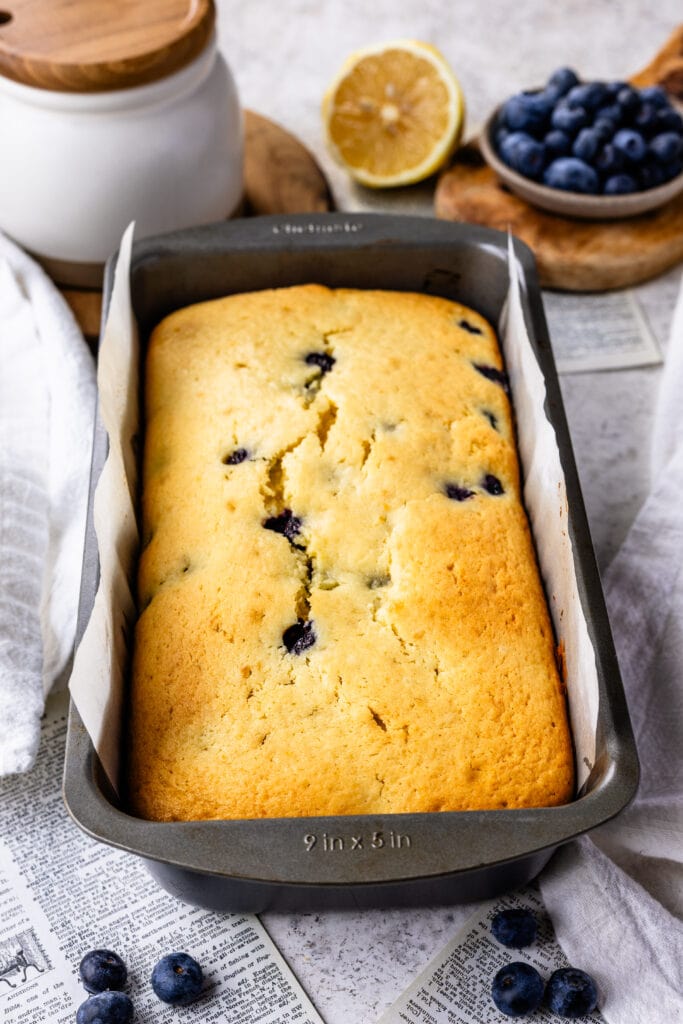 lemon blueberry loaf baked in a tin pan.