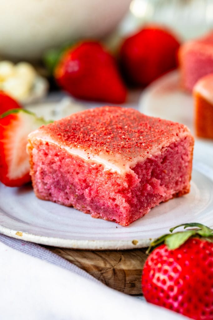 strawberry brownie slice on top of a plate.