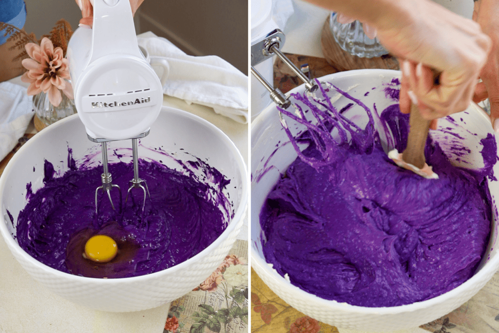 first picture: egg added to a bowl containing a purple cheesecake batter and a hand mixer. second picture: using a spatula to scrape the sides of a bowl containing purple cheesecake.