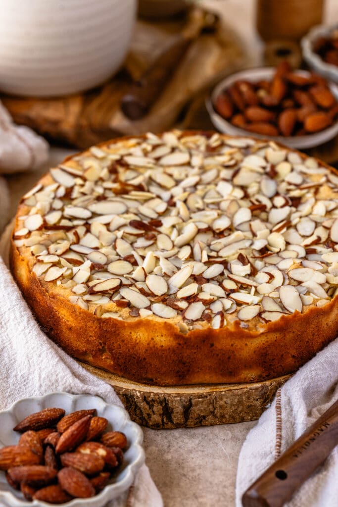 almond cake on top of a wooden board.