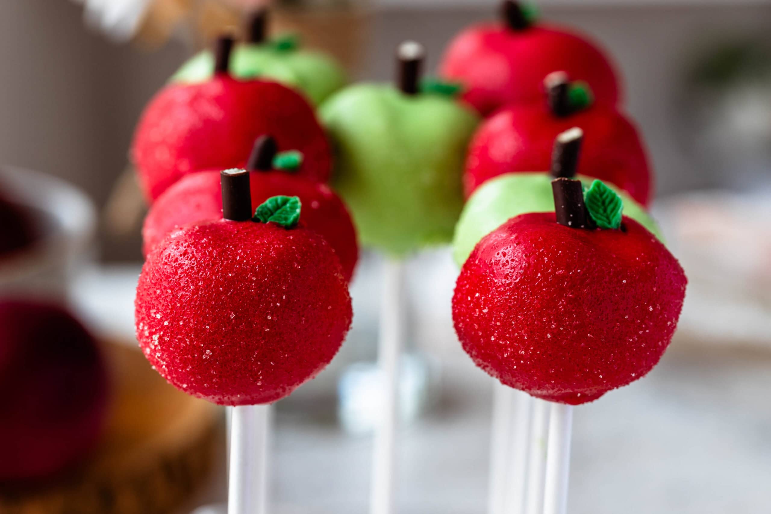apple cake pops on a tray.