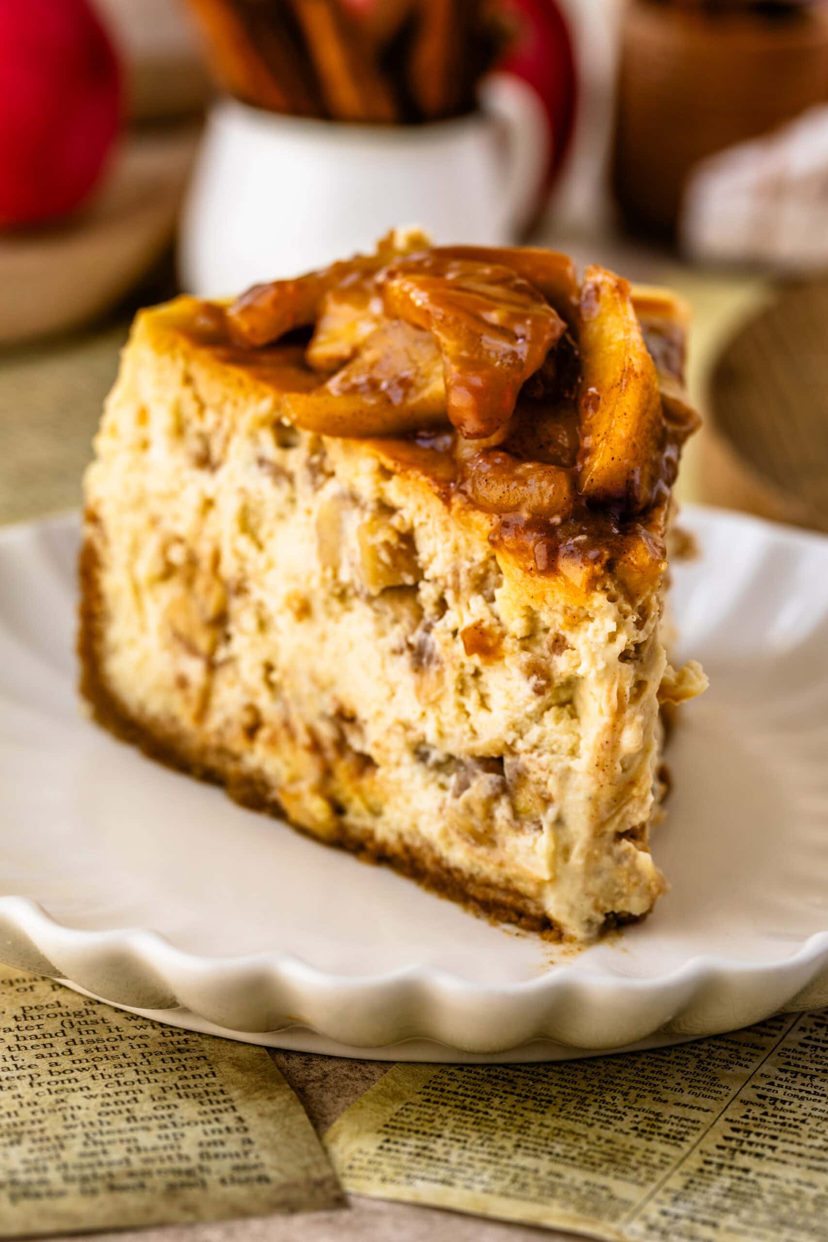 apple caramel cheesecake slice on a plate.