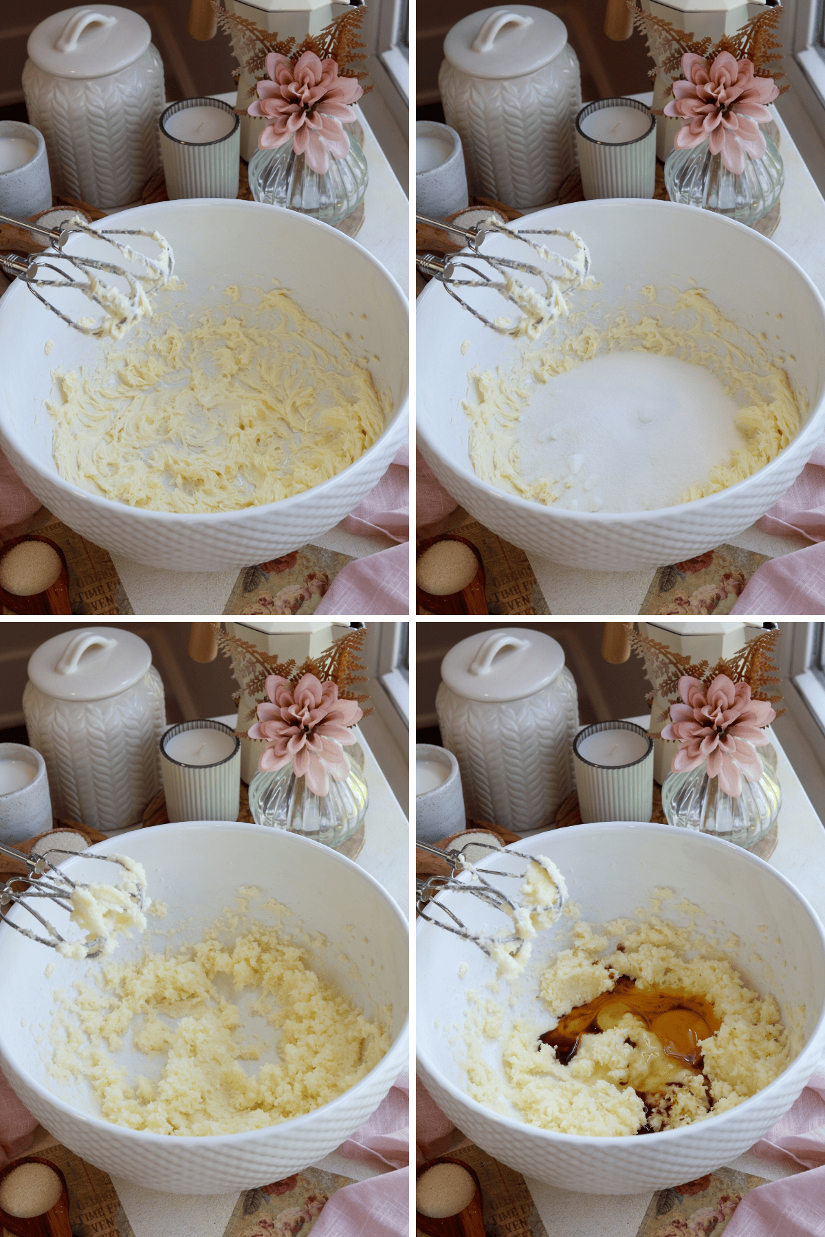 Panel with 4 images showing the process of making sugar cookies. The first image shows softened butter being mixed in a large white bowl using a hand mixer. The second image depicts sugar being added to the creamed butter. The third image displays the mixture after creaming the butter and sugar together until light and fluffy. The fourth image shows the addition of eggs and vanilla extract to the creamed mixture, ready to be incorporated. In the background, there are decorative items, such as a pink flower, candles, and jars, adding a cozy and aesthetic touch to the baking scene.