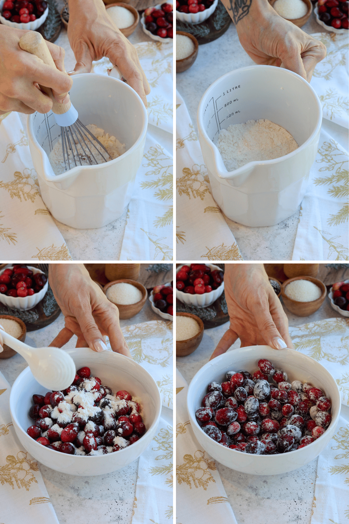 Panel with 4 images: Image one shows hands whisking dry ingredients in a white mixing bowl, preparing for the orange cranberry bread. Image two focuses on the bowl filled with flour mixture on a festive tablecloth with cranberries and sugar in the background. Image three shows cranberries being dusted with flour as they are gently stirred with a white spoon in another bowl. Image four displays the cranberries fully coated in flour, ready to be incorporated into the recipe, with festive decor surrounding the setup.