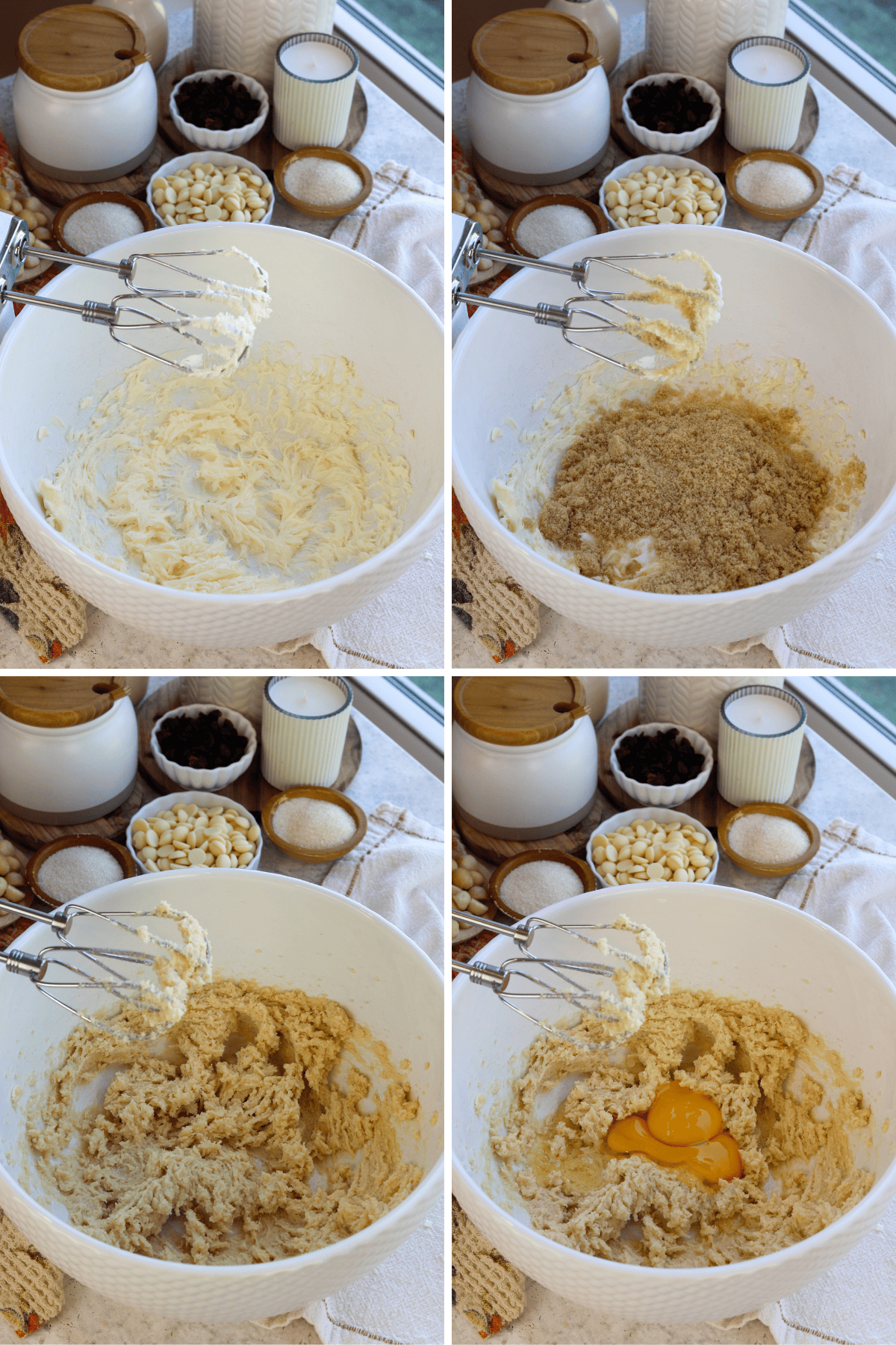Panel with four images. First image shows a white mixing bowl with softened butter being creamed using an electric mixer. Second image shows brown sugar added to the creamed butter in the mixing bowl. Third image shows the mixture after blending in the sugar with the electric mixer, creating a slightly grainy, creamy consistency. Fourth image shows two egg yolks added to the mixture in the bowl, with the mixer still in place, ready for the next mixing step. In the background of each image, various ingredients are neatly arranged, including white chocolate chips, sugar, dried cranberries, and decorative jars.