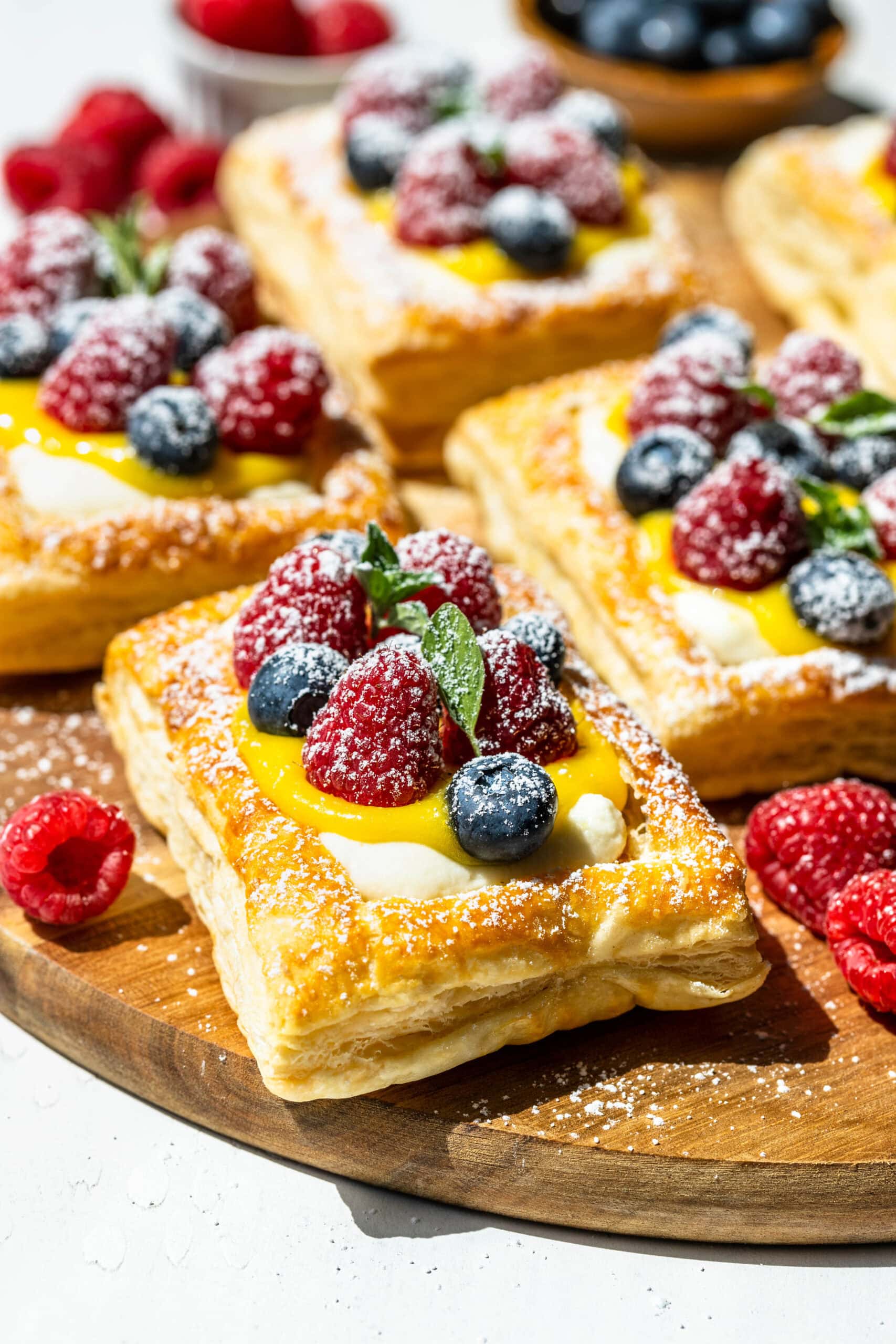 flaky puff pastry filled with mascarpone cream and fresh fruit and lemon curd.