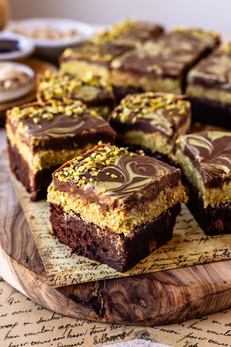 Dubai chocolate brownies with pistachio kataifi filling and chocolate ganache.