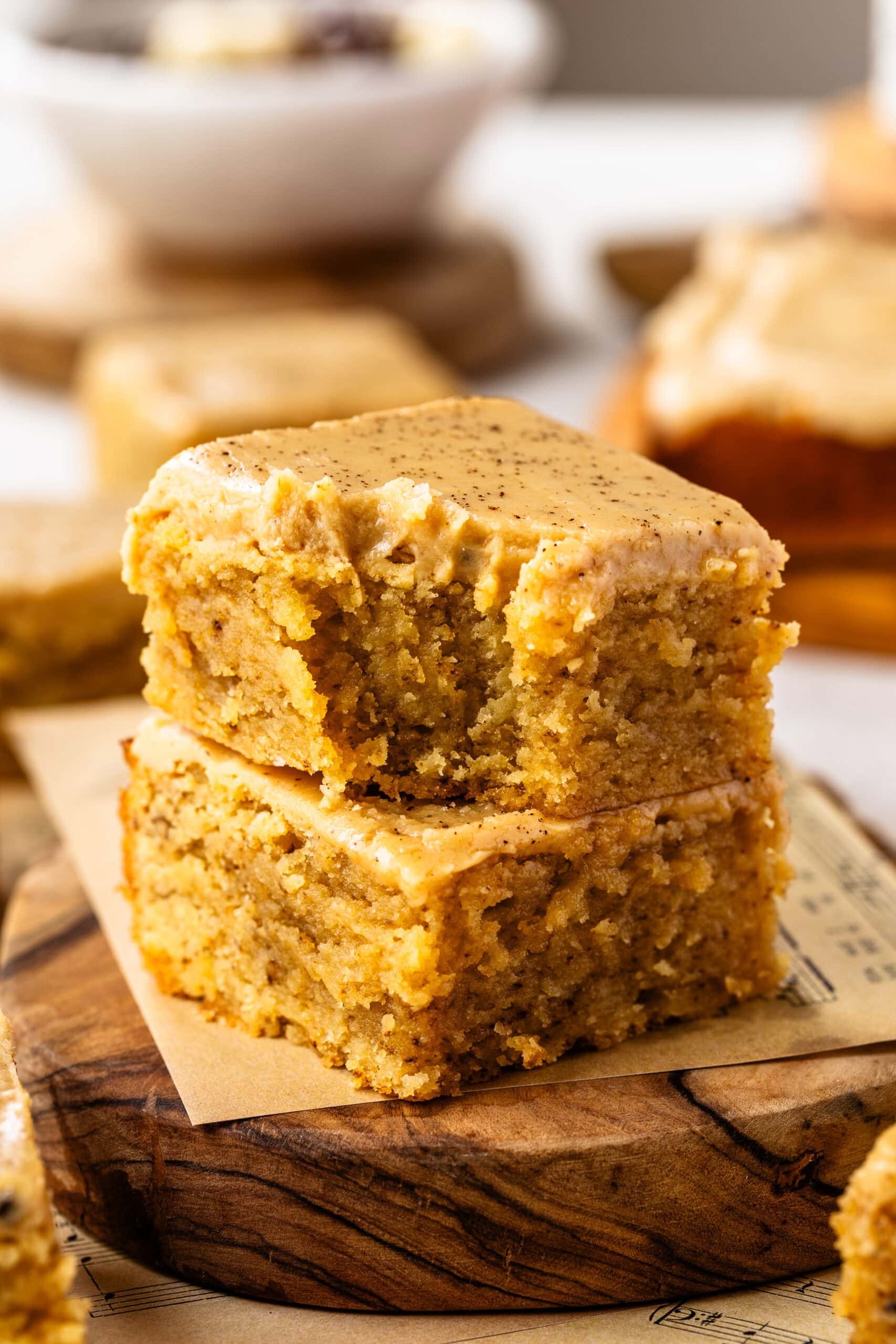 Freshly baked cornbread squares with a moist, crumbly texture.