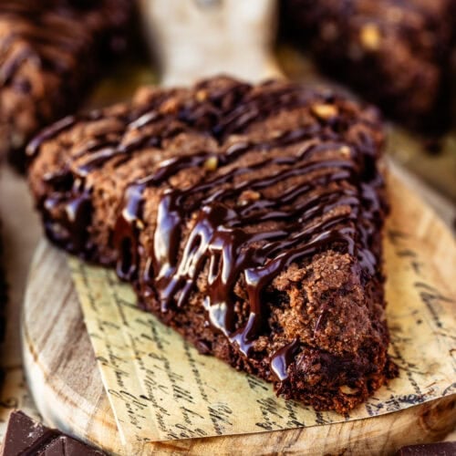 A freshly baked espresso chocolate scone drizzled with a silky chocolate ganache.