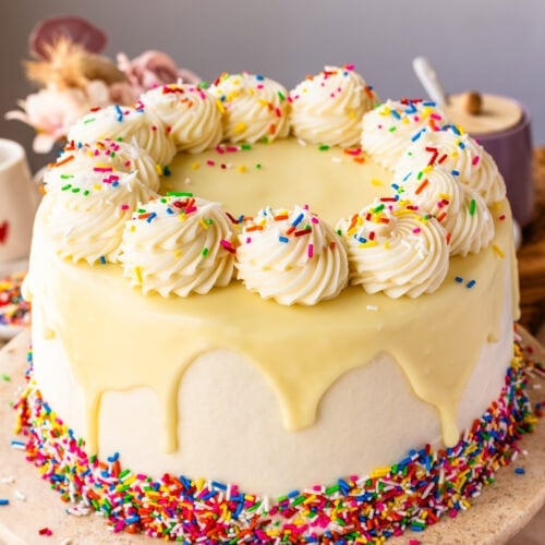 A full funfetti cake descorated with white chocolate ganache, cream cheese frosting, and, of course, sprinkles!