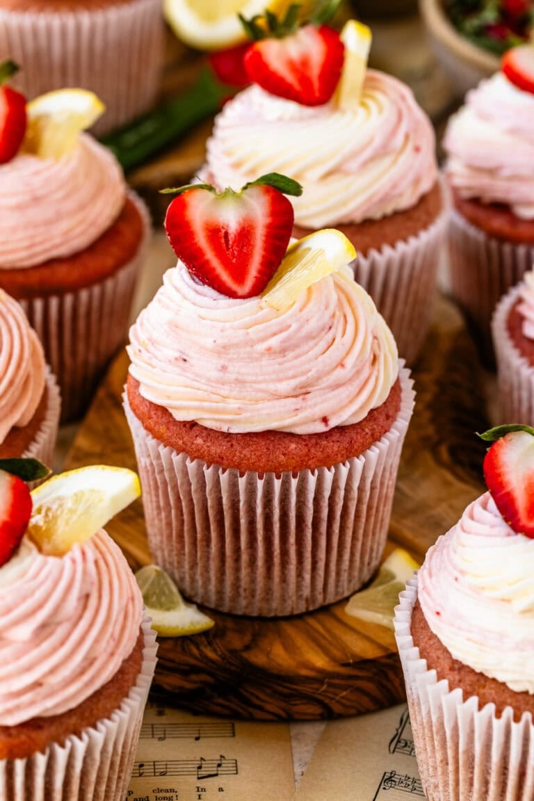 Close-up of a strawberry lemonade cupcake filled with strawberry curd.
