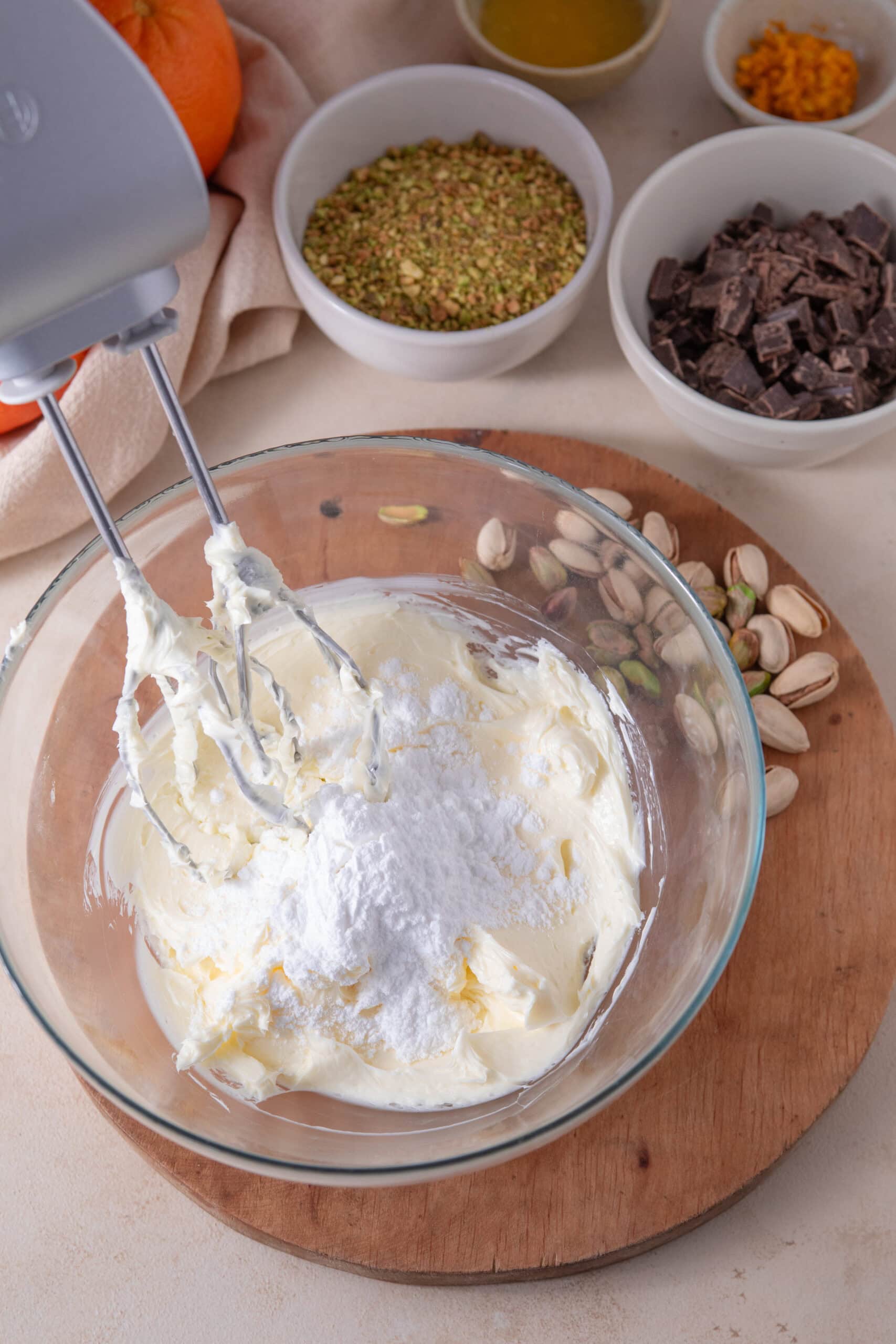 Mixing butter and powdered sugar for orange pistachio shortbread cookies