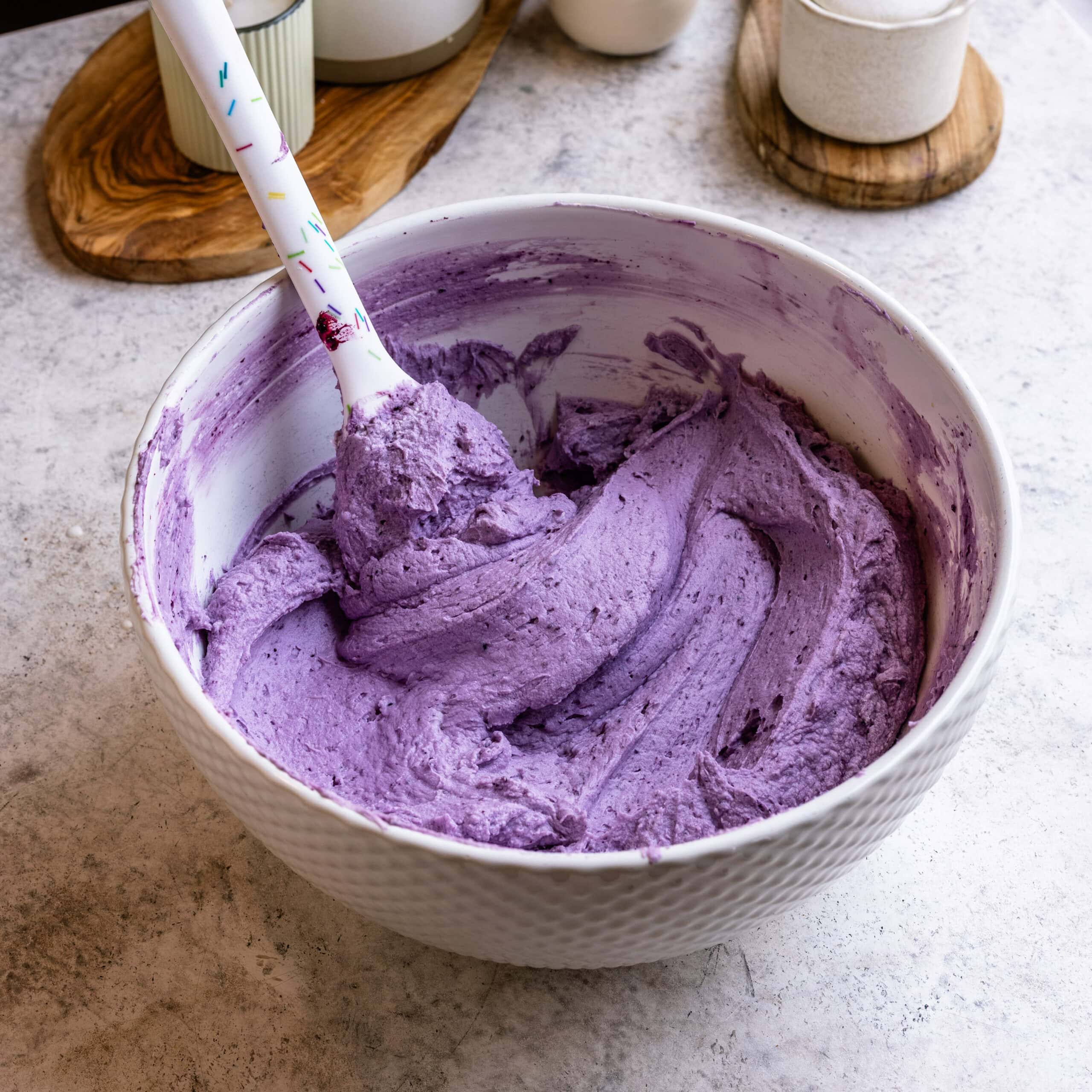 Fluffy, purple, and tasty blueberry cream cheese frosting.