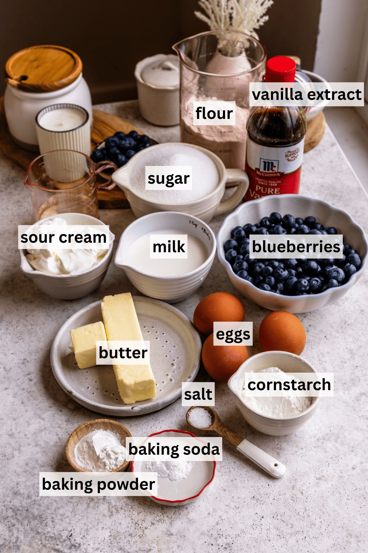 Labeled ingredients for Blueberry Chantilly Sheet Cake on a granite surface.