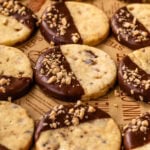 Toffee shortbread cookies dipped in milk chocolate and topped with crunchy toffee bits.