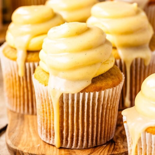 Vanilla cupcakes topped with vanilla German buttercream and vanilla bean ganache.