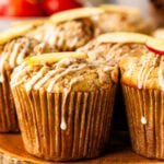 Apple muffins with cinnamon crumble topping and cream cheese glaze.
